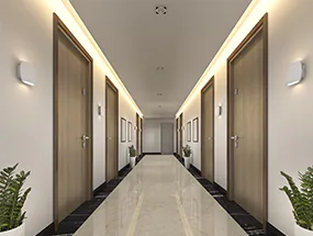 a hallway lighted by led-stripes